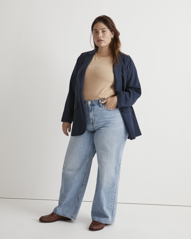 Front of a model wearing a size 22W Superwide Leg jeans in Varian Wash by Madewell. | dia_product_style_image_id:327715